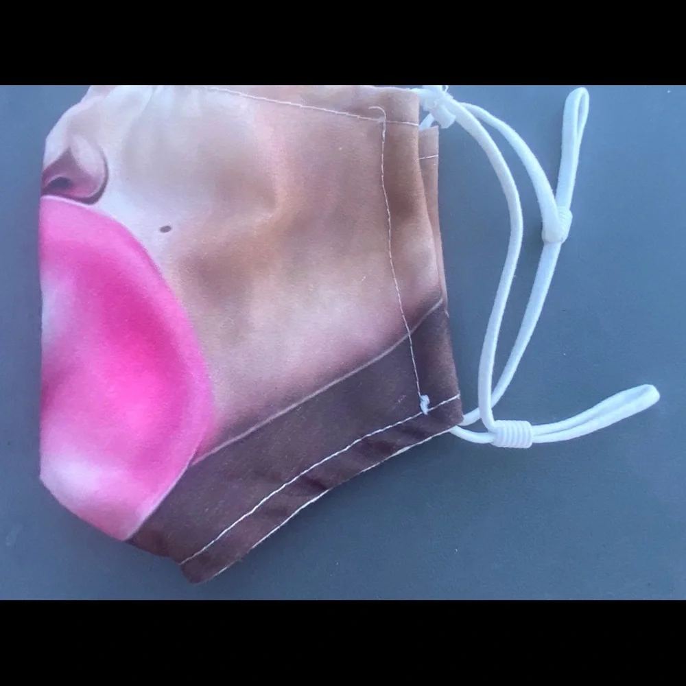 FUN mask! Has 2 NEW filters for inside pouch